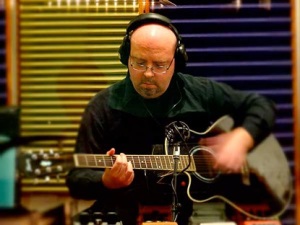 Chris McCarter of Ikon laying down some acoustic guitar in Tracking Room 1 at Toyland Recording Studio.